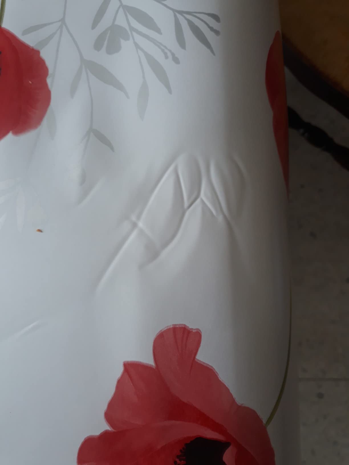 Promo Linge Bulgomme protège table coquelicot 140x140