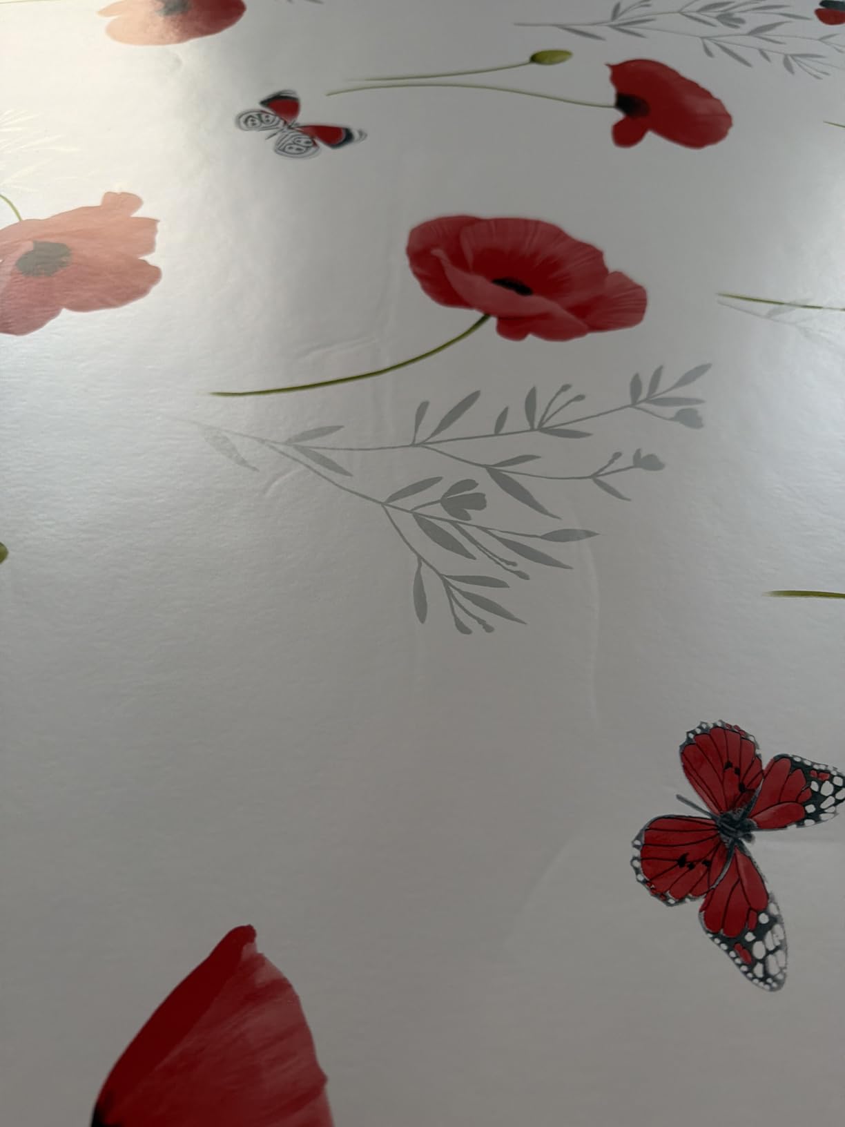 Promo Linge Bulgomme protège table coquelicot 140x140