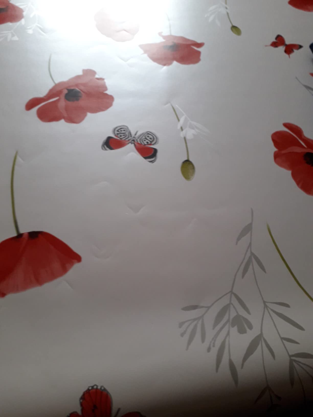 Promo Linge Bulgomme protège table coquelicot 140x140